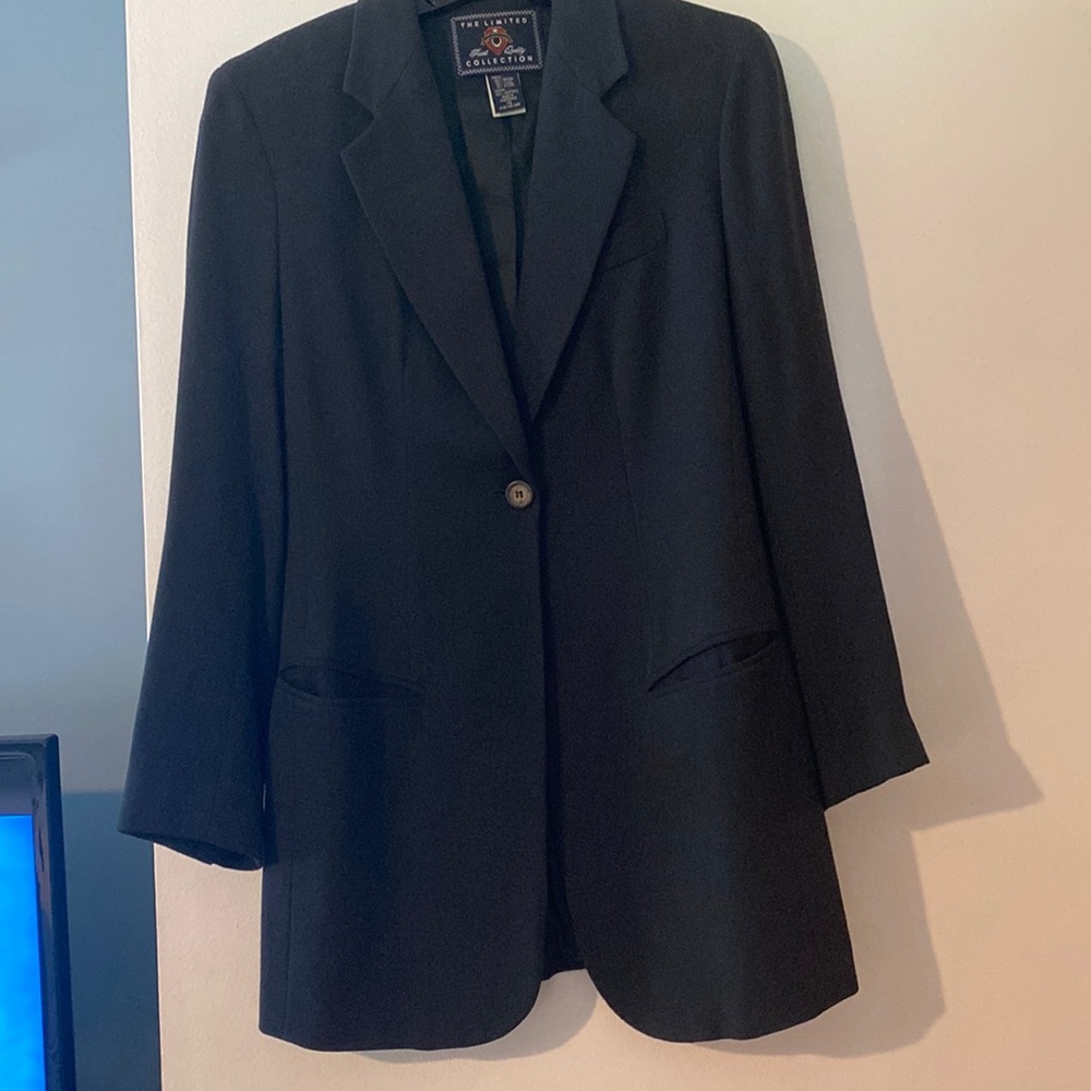 Limited Collection two piece, dark green women’s suit.